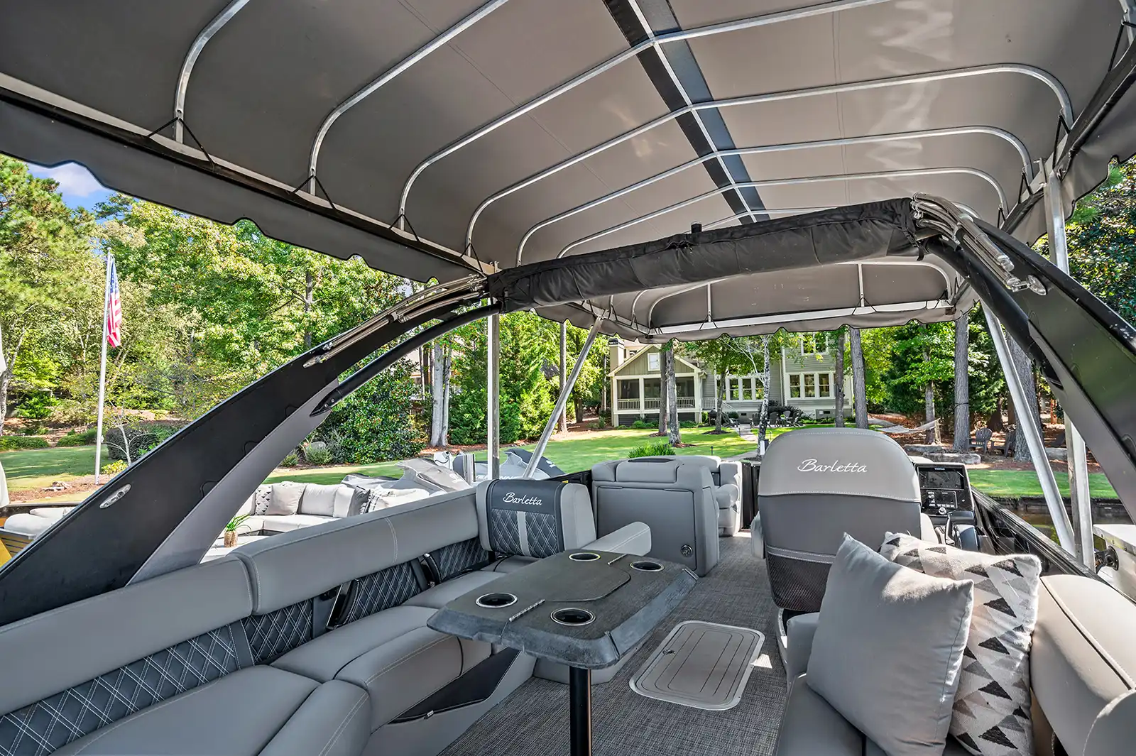photo taken from a boat looking at luxury lake home on Lake Oconee, GA
