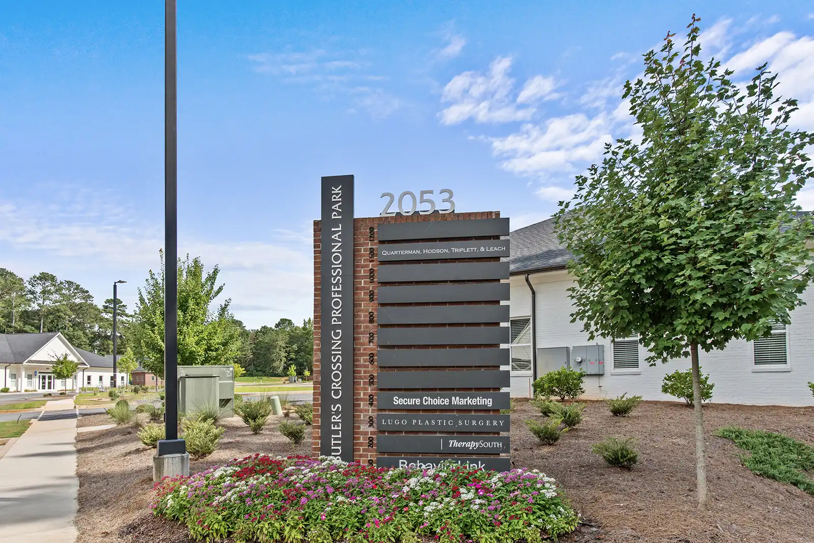 Commercial property shown within its surrounding landscape