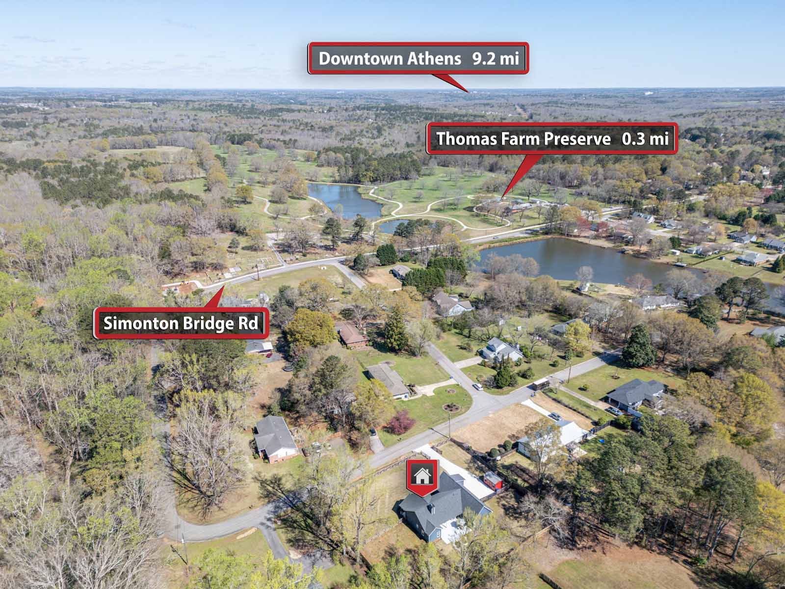 Aerial real estate image showing land and surrounding location