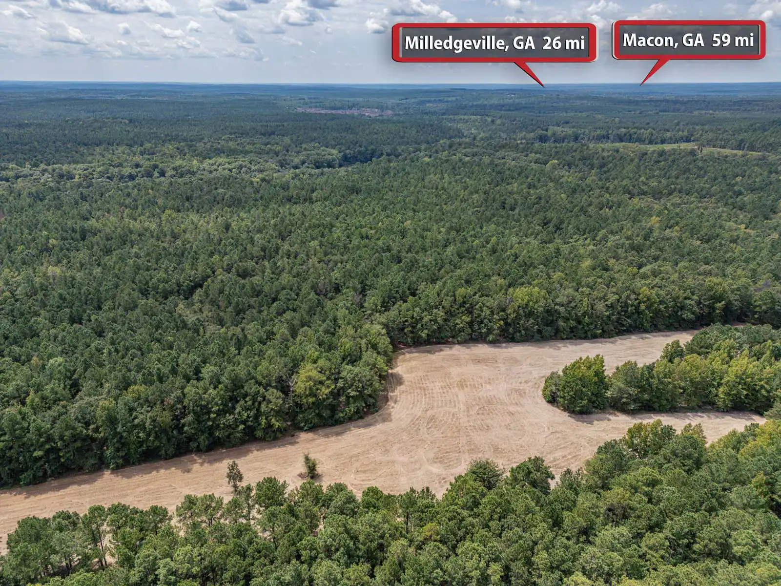 Timberland Lot With Creek, Field, and Lake Access Photos in Sparta, Georgia image 4
