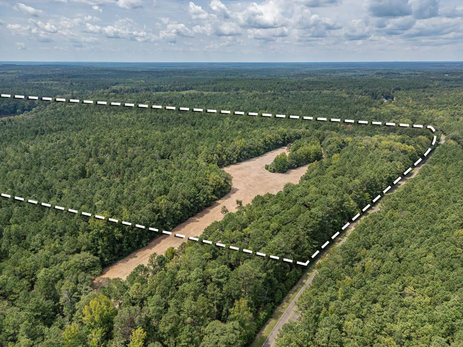 Timberland Lot With Creek, Field, and Lake Access Photos in Sparta, Georgia image 3